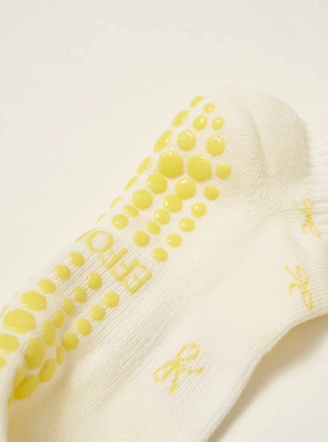 Butter Bow Ruffle Grip Sock